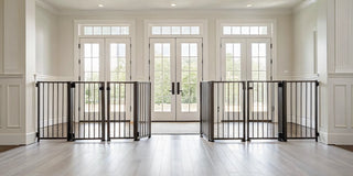 A modern 6 foot wide pet gate in a home entryway with hardwood floors.
